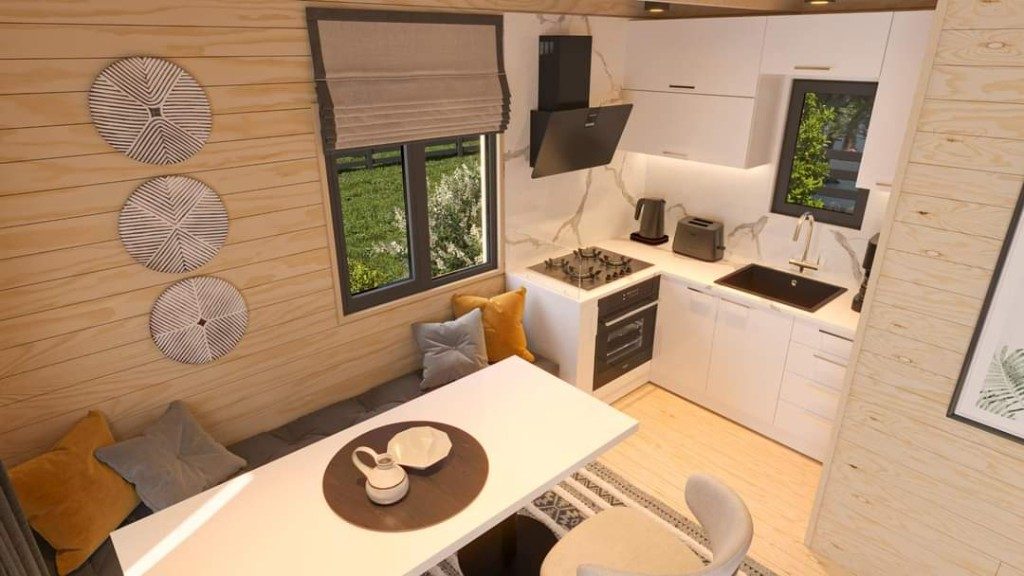 Ahşap tiny house — teras oturma alanı